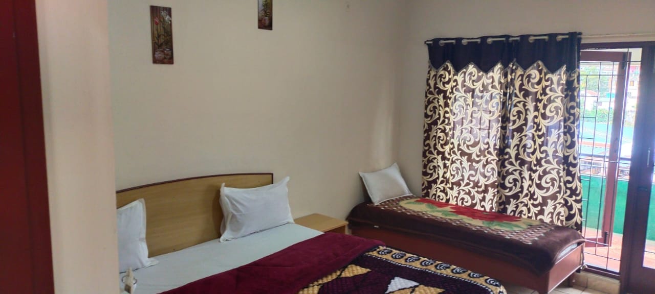 கொடை ஆர்க்கே வில்லா விசாலமான அறை